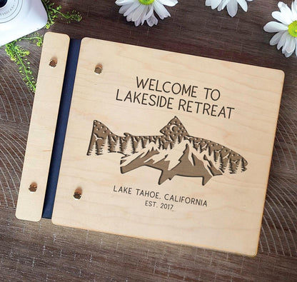 Lake house vacation rental guest book wood cover engraving close up detail